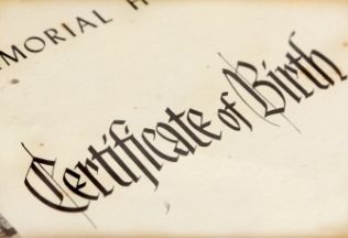 Close-up of a birth certificate document – NRIWAY company services.